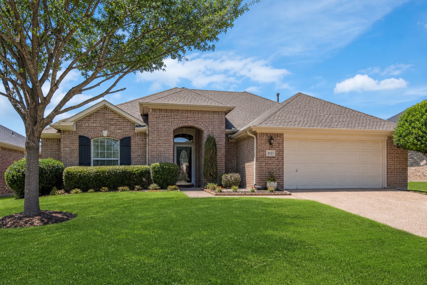 Brick Texas suburban home exterior — foundation damage coverage depends on cause and policy terms